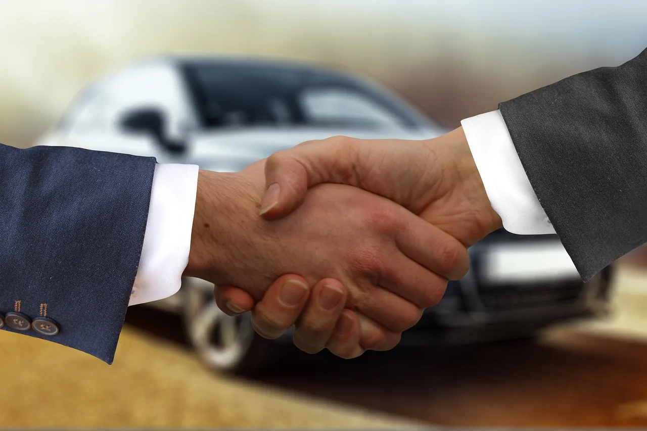 What is a buyer's premium in a car auction?